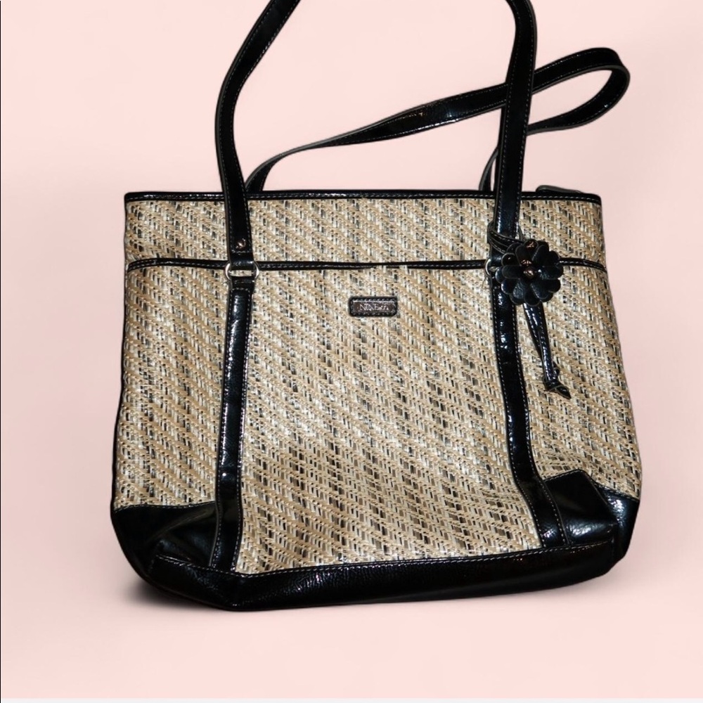 Nine & Co beige and black woven tote bag with black strap and zipper closure